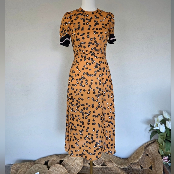 SAYLOR Dresses & Skirts - Saylor Mustard Floral Open Back Midi Dress Size Small Puff Sleeve Tie Back S